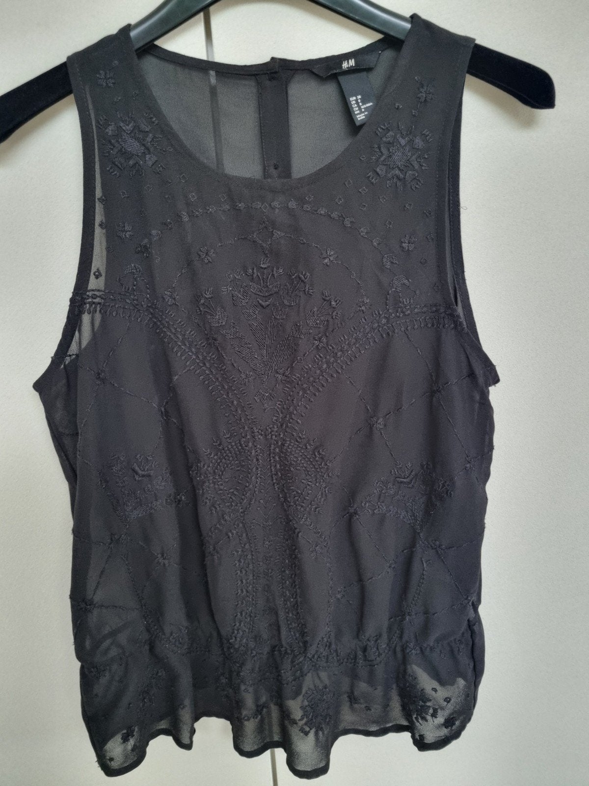 Blouse noire sans manches H&M taille 38, Sans manches, Enlèvement ou Envoi, Comme neuf, Noir