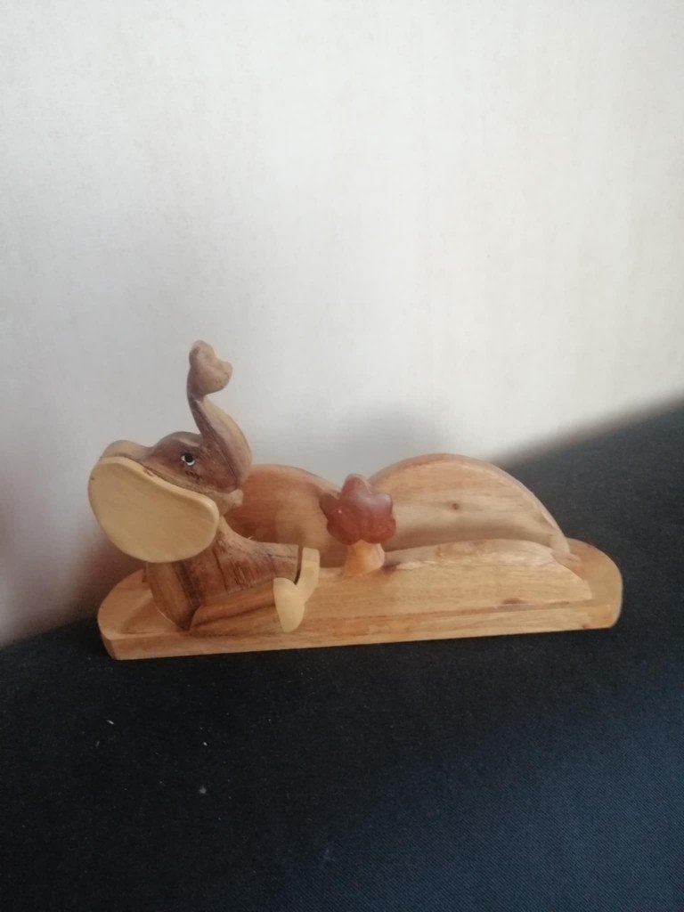 Houten brievenhouder olifant, Ophalen