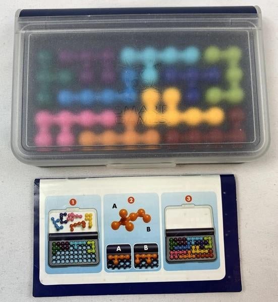 Smart Games IQ Fit Thinking Game Jeu de voyage Logic Smartga, Hobby & Loisirs créatifs, Jeux de société | Jeux de plateau, Comme neuf