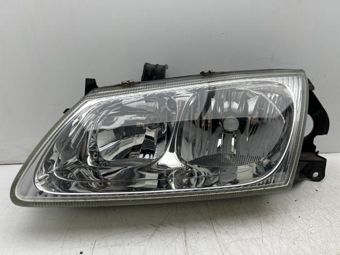 Koplamp links van een Nissan Almera, Gebruikt, -, -, Ophalen of Verzenden