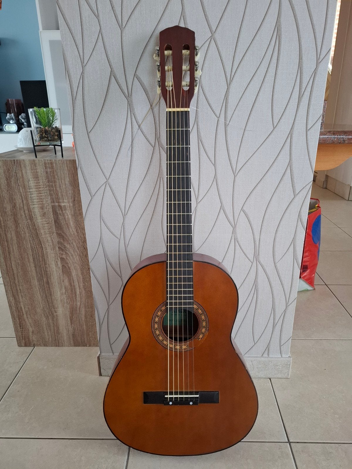 Akoestische gitaar, Ophalen
