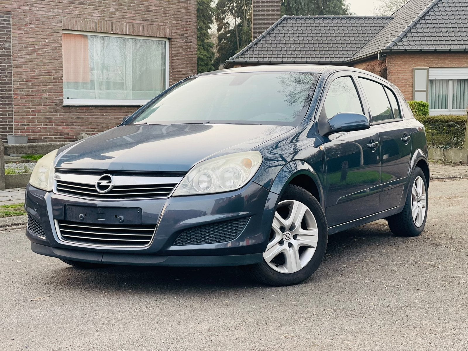 Opel Astra 1,4 benzine airco gekeurd met carpass 0485391477, Auto's, Elektrische ramen, Stof, Particulier, Euro 4