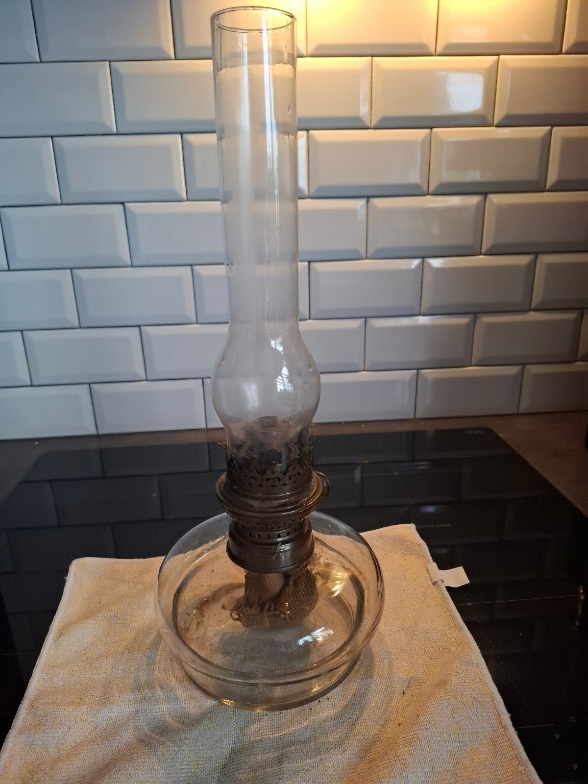 Quinquet en verre ancien, Ophalen