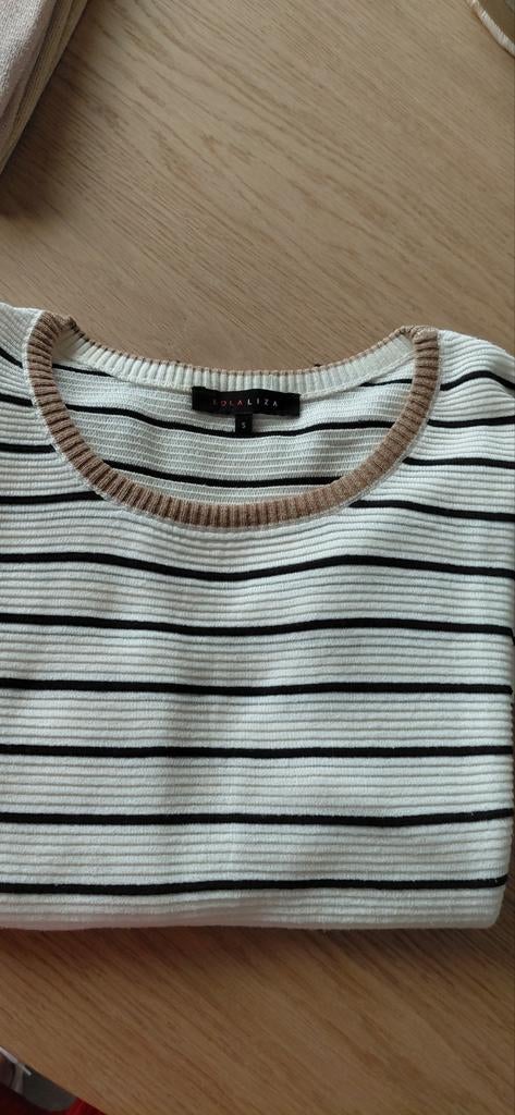 Trui maat small, Ophalen