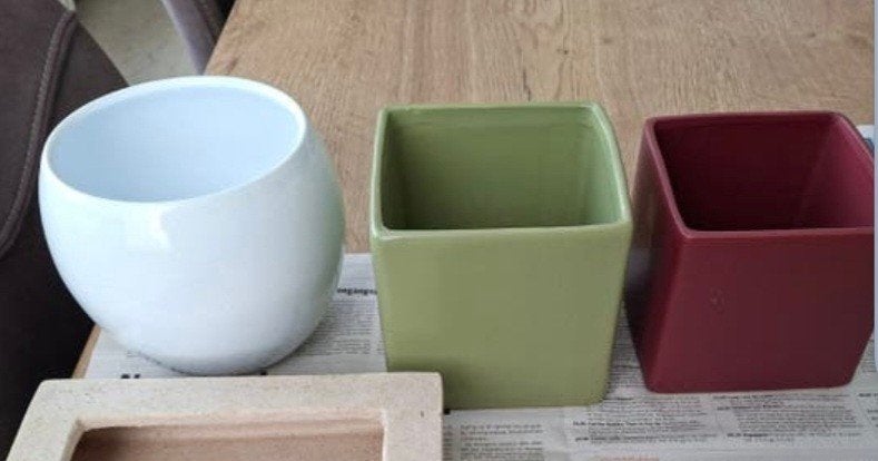 set van 4 bloempotten, Ophalen
