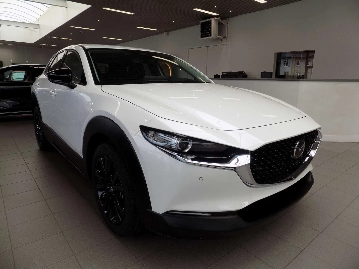 Mazda CX-30 2.0i SKYACTIV-X Homura Automaat, Auto's, Mazda, Automaat, 1998 cc, Stof, Zwart