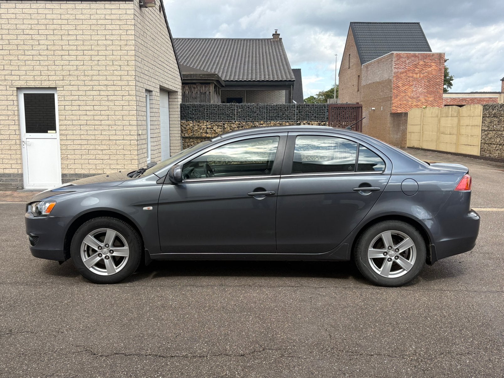 Mitsubishi Lancer 1.5 Benzine – 2010, Autos, Mitsubishi, 144 g/km, Argent ou Gris, Entreprise, Boîte manuelle