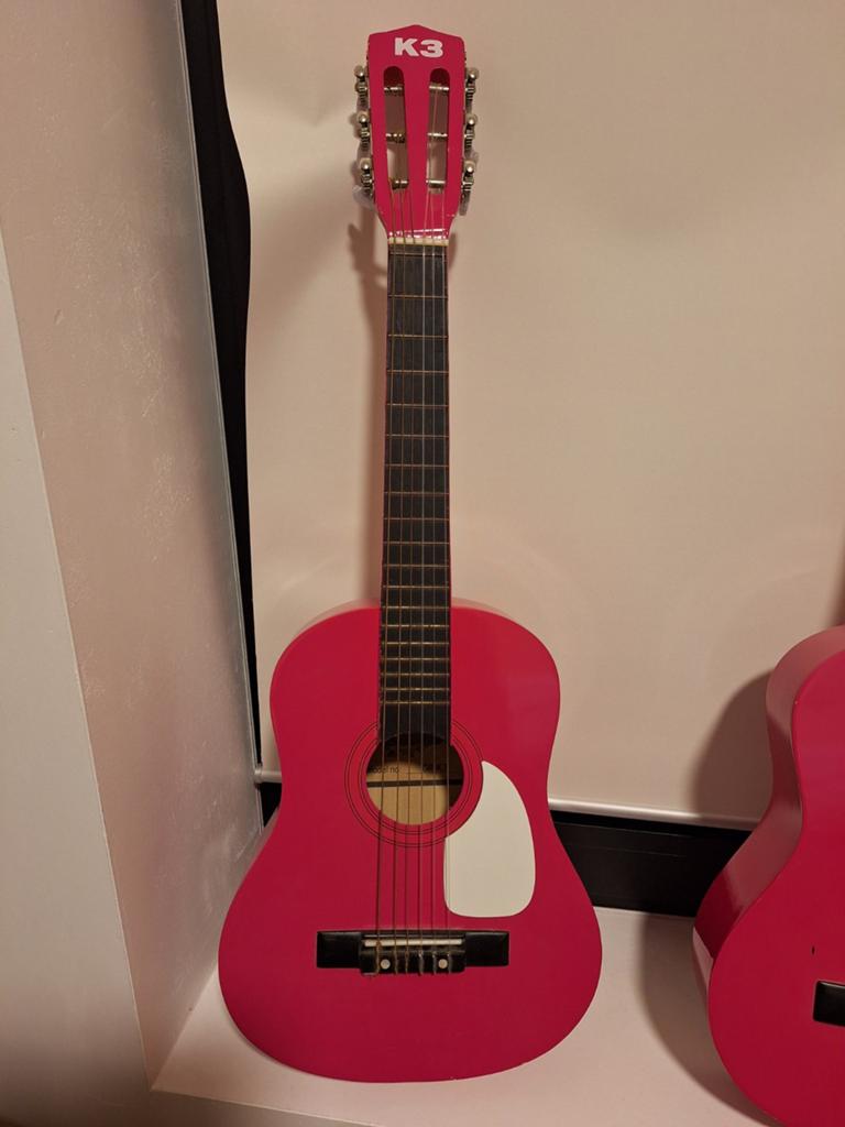 K3 gitaar, Ophalen