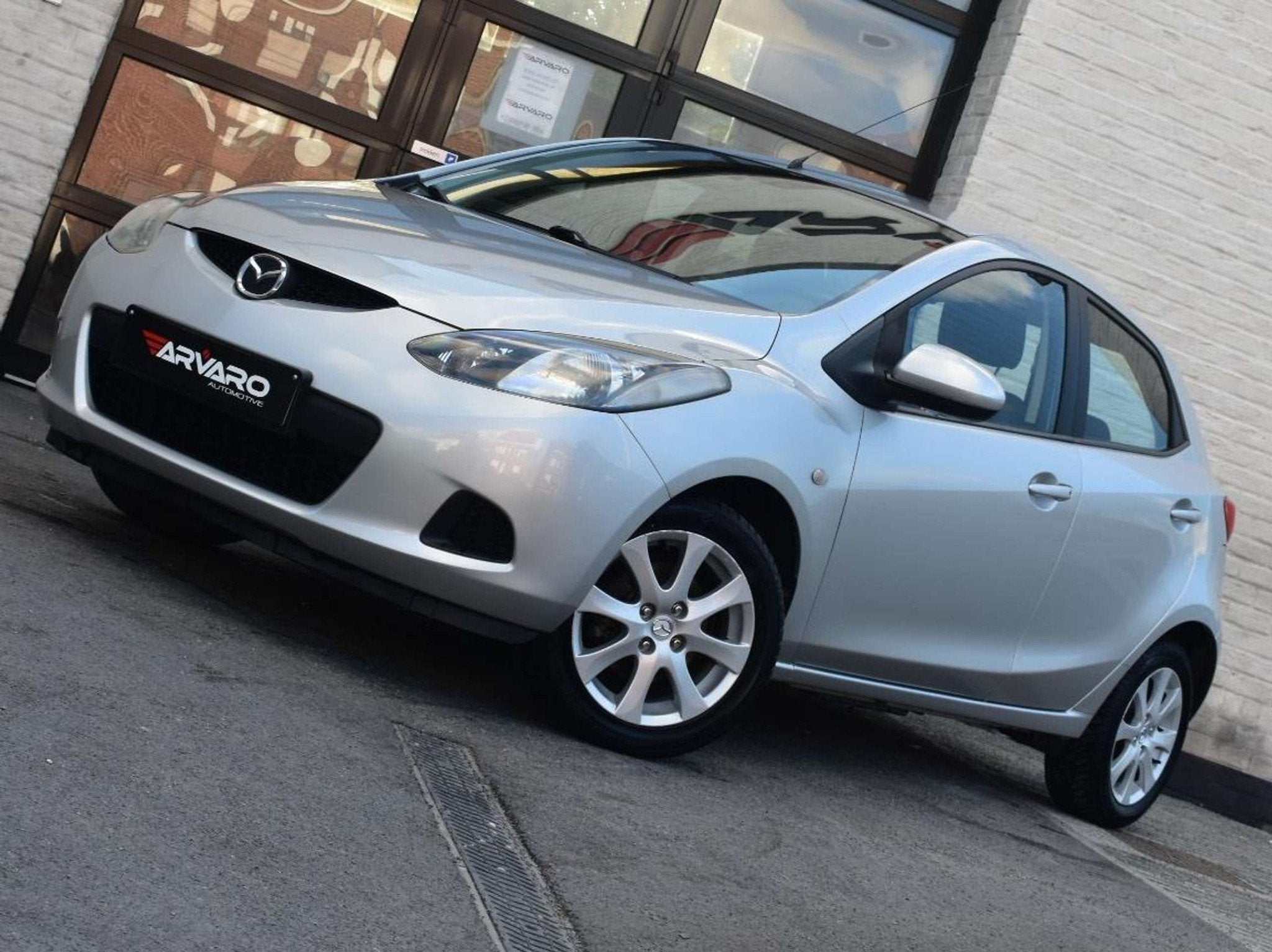 Mazda 2 1.3i Challenge / Airco / 1e Eig / Carplay / 96Dkm /, Stof, 4 cilinders, 5 deurs, Zilver of Grijs