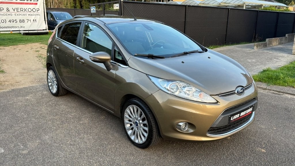 Ford Fiesta 1.25i Titanium | Nette Staat - Digitale Airco |, Auto's, Voorwielaandrijving, Stof, Zwart, 1249 cc