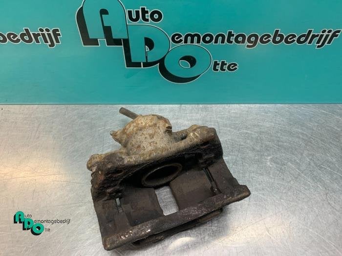 Etrier de frein (pince) avant gauche d'un Renault Clio (Clio, Renault, -, 3 mois de garantie, Utilisé