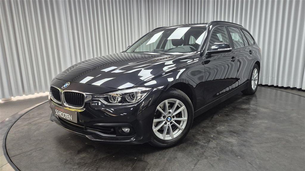 BMW 3 Serie 318 Touring (bj 2019, automaat), Auto's, BMW, Gebruikt, Euro 6, 136 pk, Zwart