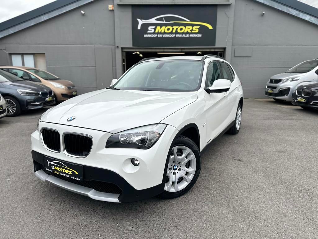 BMW X1 sDrive18i | AUTOMAAT | Cruise | Gps | GARANTIE |, Auto's, Euro 5, 1995 cc, Wit, Leder