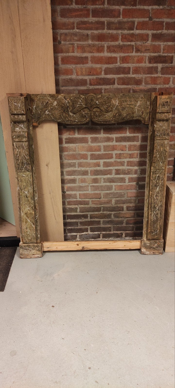 Antieke houten schouwomlijsting, Ophalen