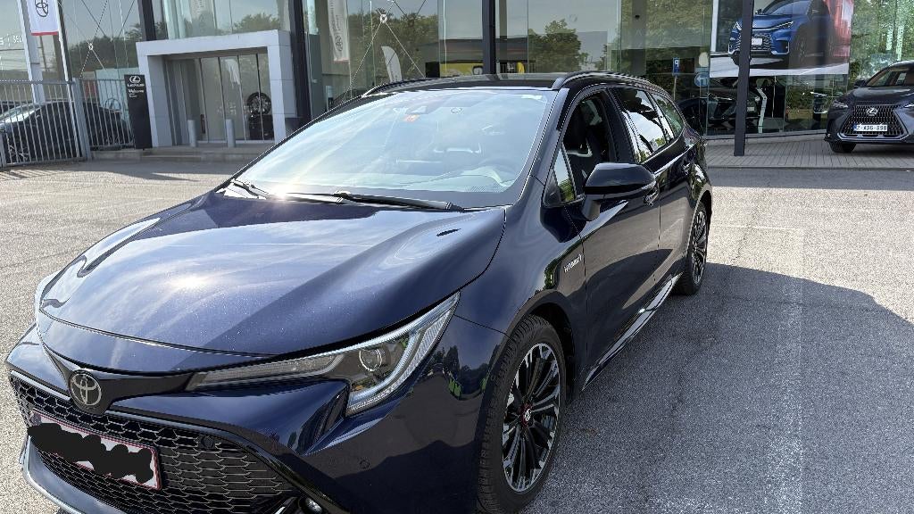 Toyota Corolla Touring GR Sports 1.8 HYBRIDE, Auto's, 4 cilinders, Corolla, 5 deurs, Overige carrosserie