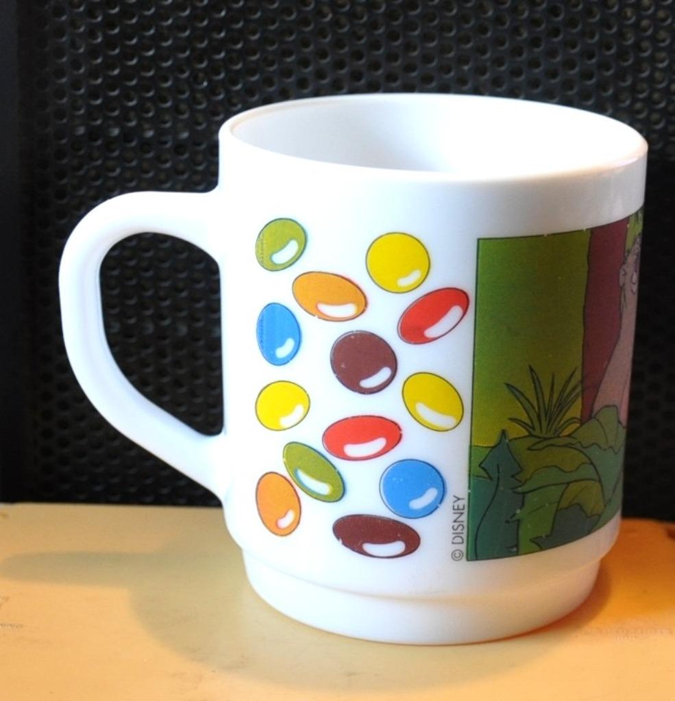 mug publicitaire smarties decor livre de la jungle, Ophalen of Verzenden, Gebruikt, Overige materialen, Kop(pen) en/of Schotel(s)