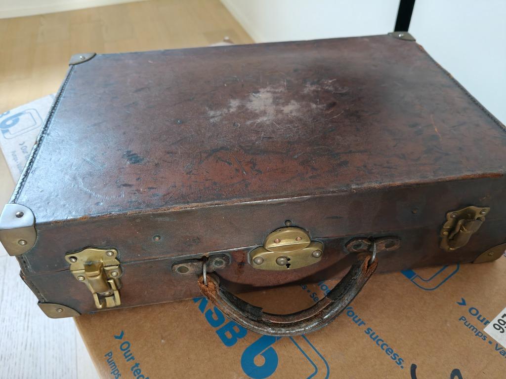 Étui en cuir vintage, Enlèvement