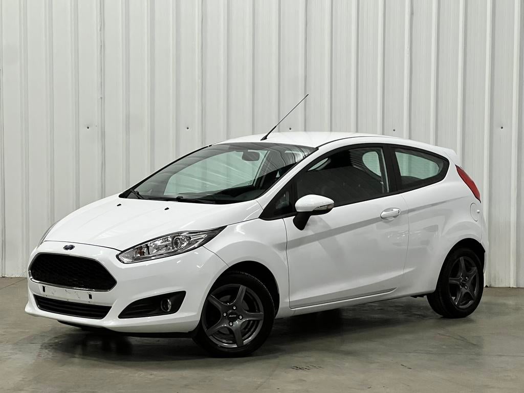 - Ford Fiesta - 1.25 Benzine - BJ 07/2016 - 130.000km - PDC, Voorwielaandrijving, Stof, 4 cilinders, Wit