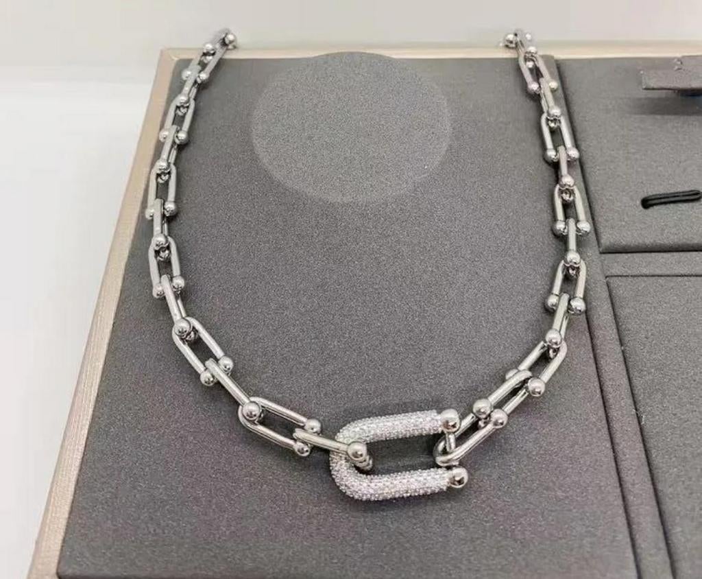 Collier fer a cheval couleur argent, Or, Or