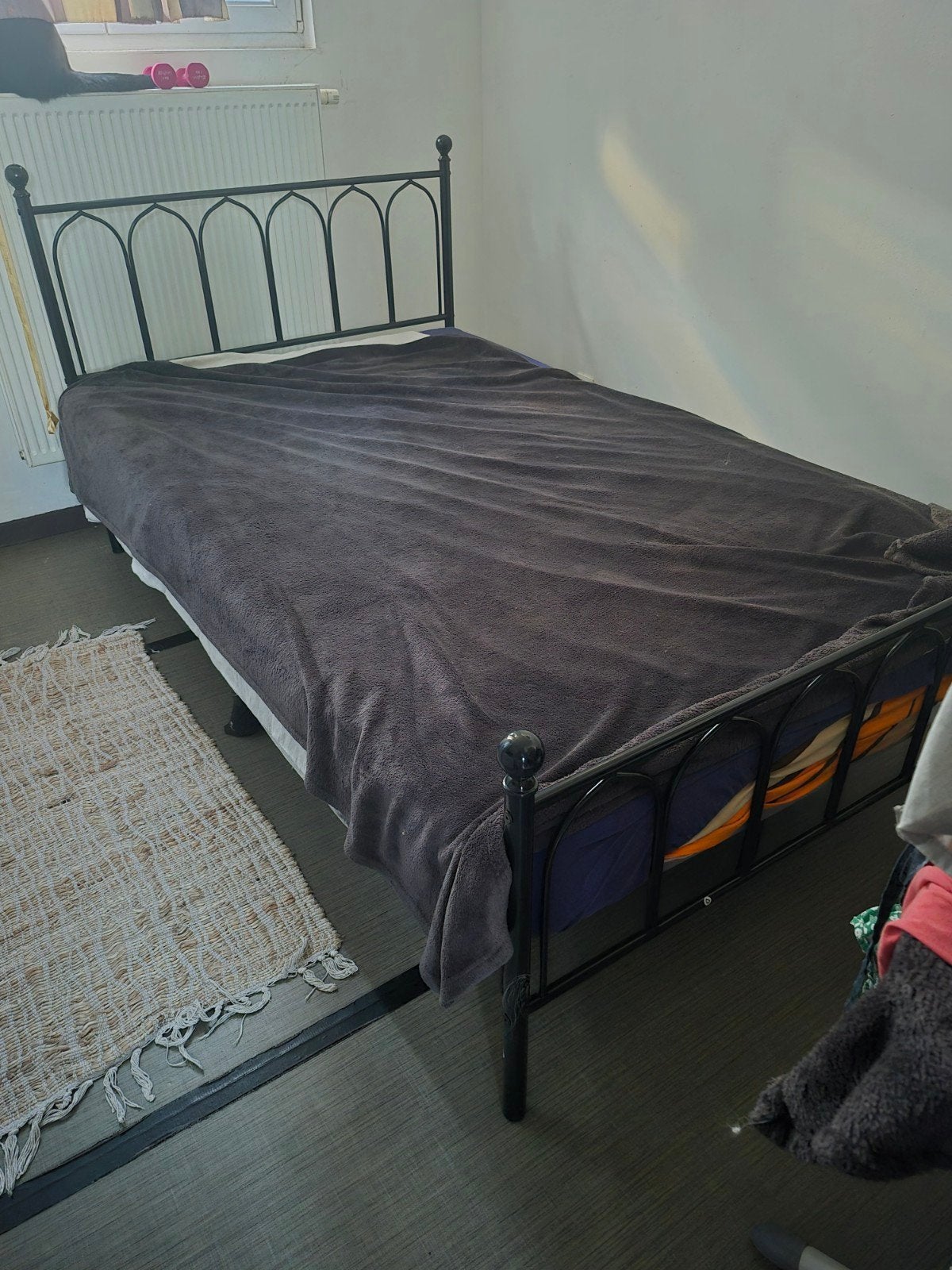 Ijzerbed met matras, Ophalen
