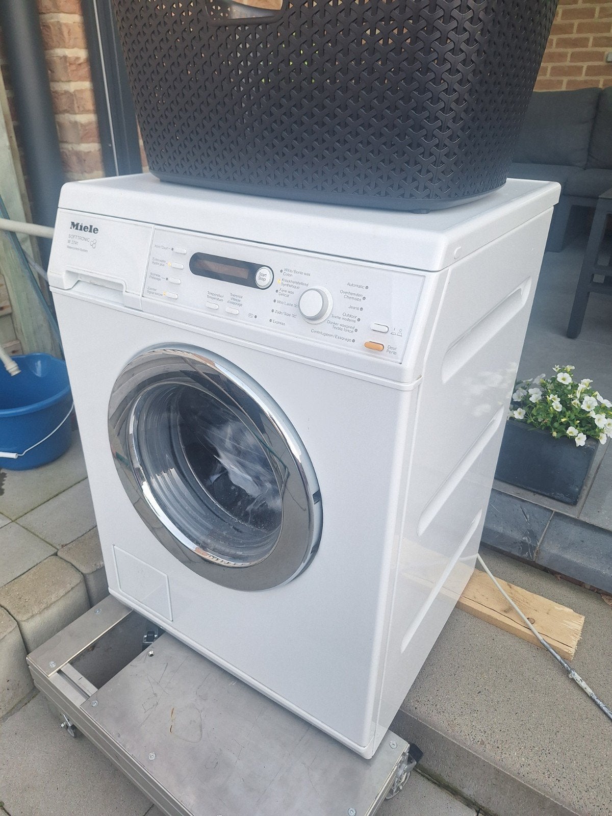 Miele wasmachine, Ophalen