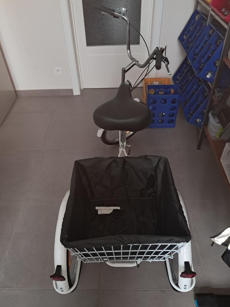 Nieuwe driewieler, Ophalen