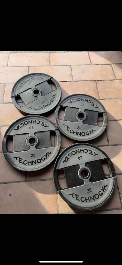 DISQUES DE POIDS TECHNOGYM 10 KG / 20KG, Sports & Fitness, Équipement de fitness, Comme neuf, Plaques d'haltères, Bras, Jambes