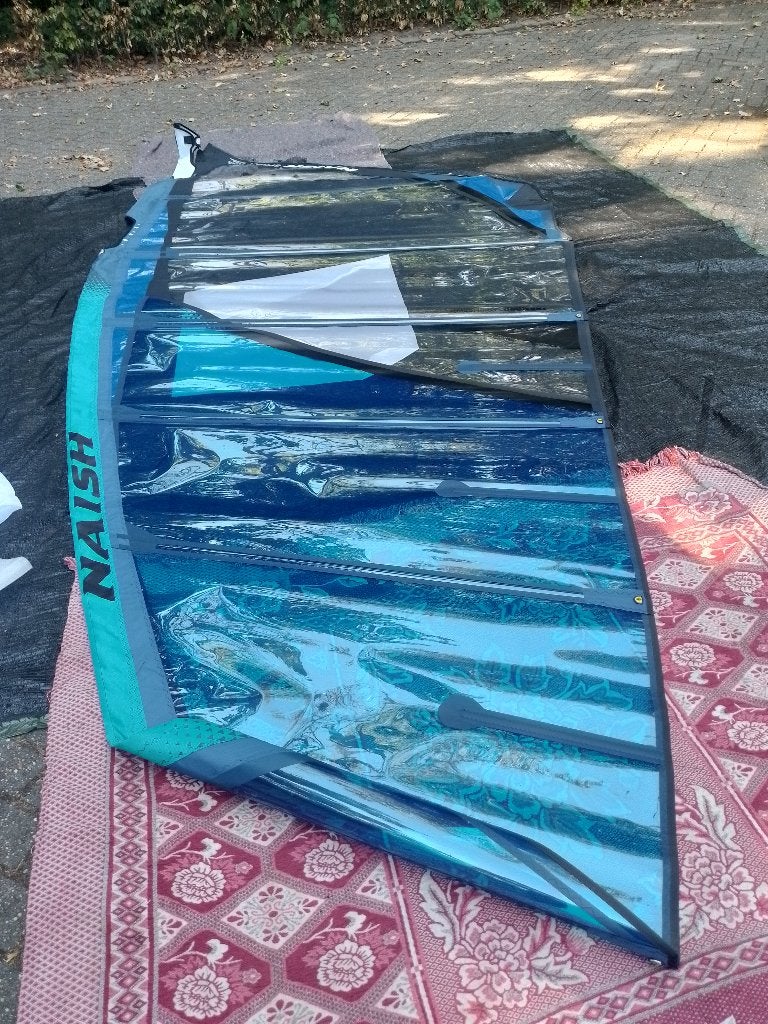 NAISH SPRINT 7.7 - FREERACE –NIEUW - 500 EUR, Watersport en Boten, Windsurfen, Ophalen, 6.5 m² tot 8 m², Nieuw, Zeil