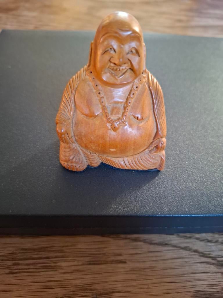 Petit Bouddha en bois, Enlèvement