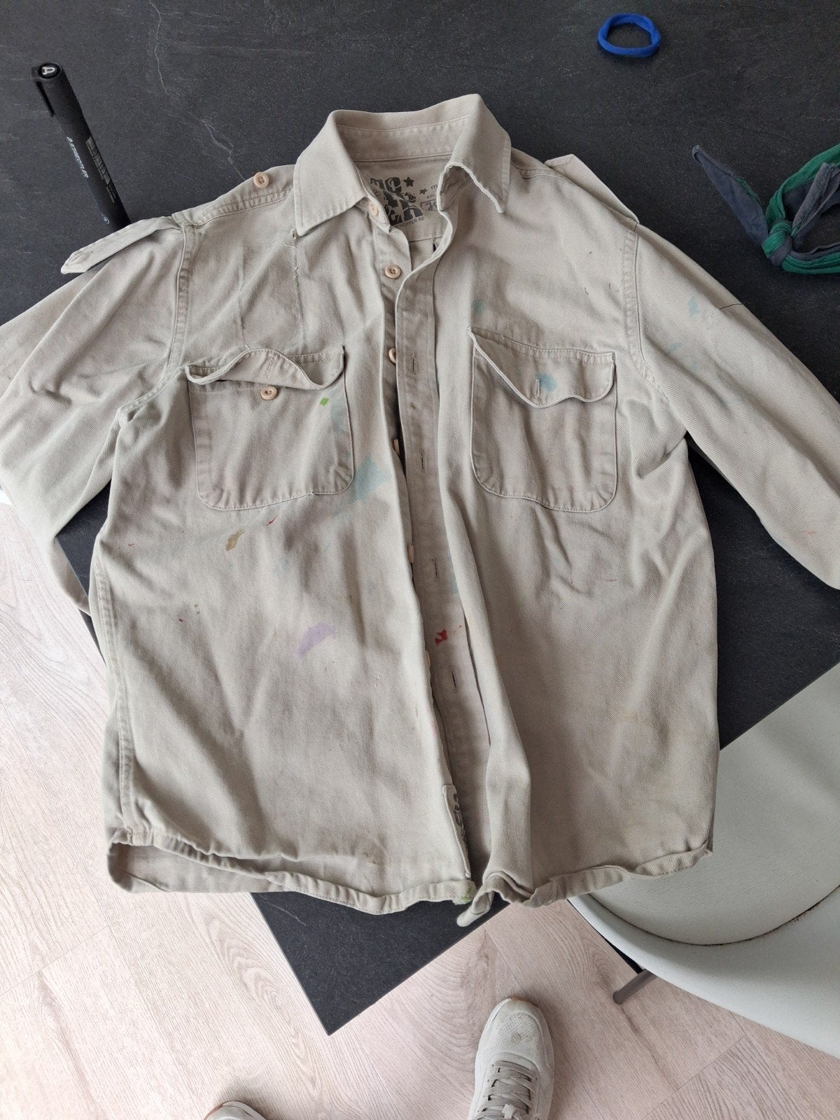 Scoutshemd maat 10, Ophalen
