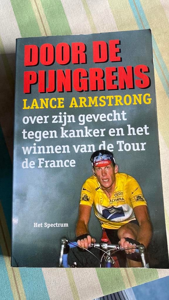 Boek Lance Armstrong : door de pijngrens, Boeken, Ophalen of Verzenden, Zo goed als nieuw, Lopen en Fietsen
