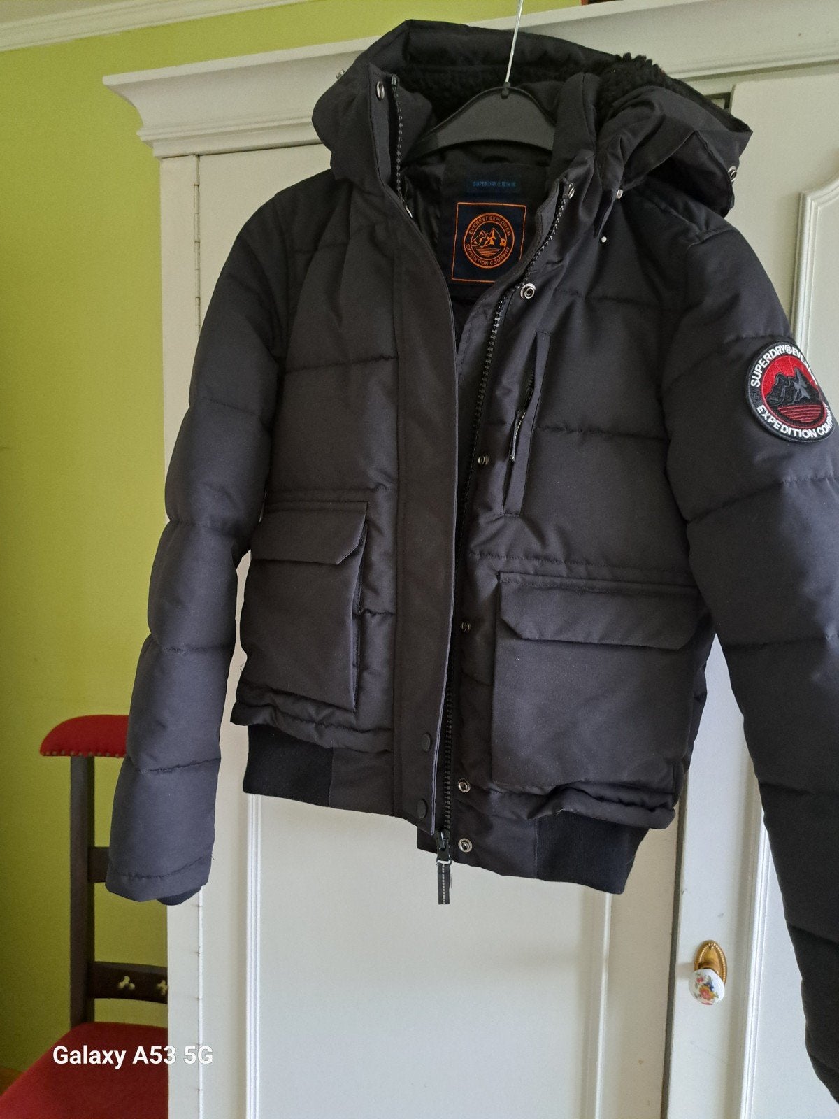 doudoune noire pour femme, Enlèvement