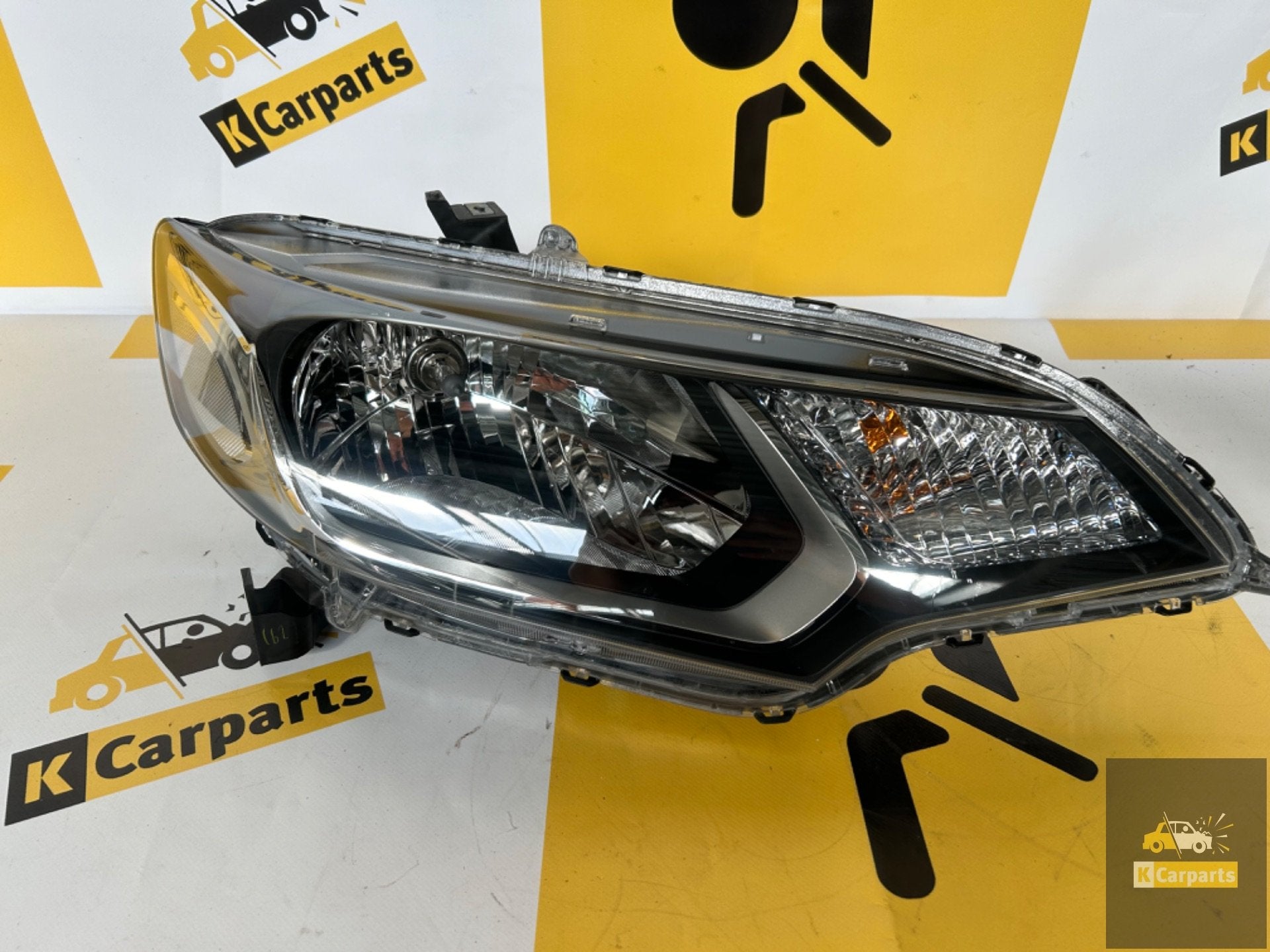 Honda Jazz Rechts Voor koplamp origineel koplamp, Fabrikantstraat 1
1000 AA  Amsterdam, NL, Info@fabrikant.eu, Honda, Fabrikant BV