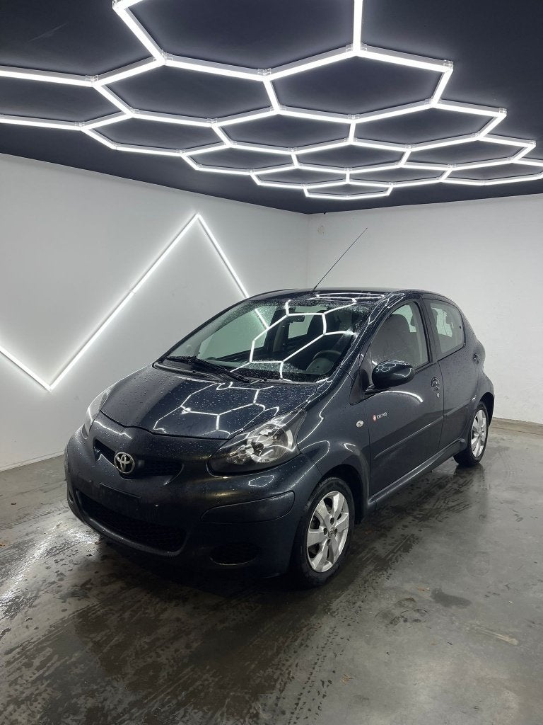 TOYOTA AYGO I 2012 I 64.276 KM I 1 AN DE GARANTIE AIRCO, Autos, Achat, 50 kW, Entreprise, Noir