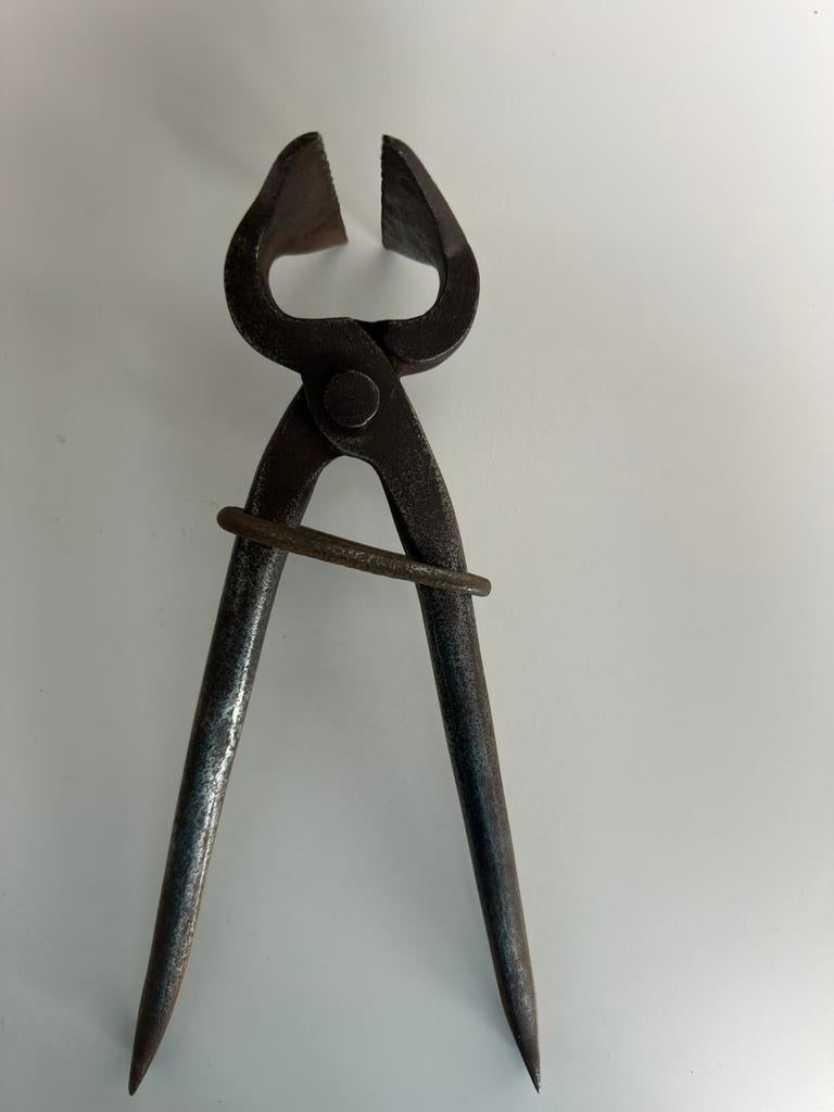 Spantang of singeltang handgesmeed, Ophalen