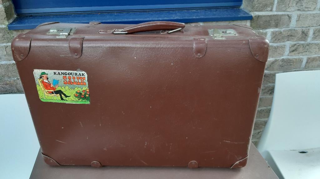 Vintage reiskoffer, Ophalen