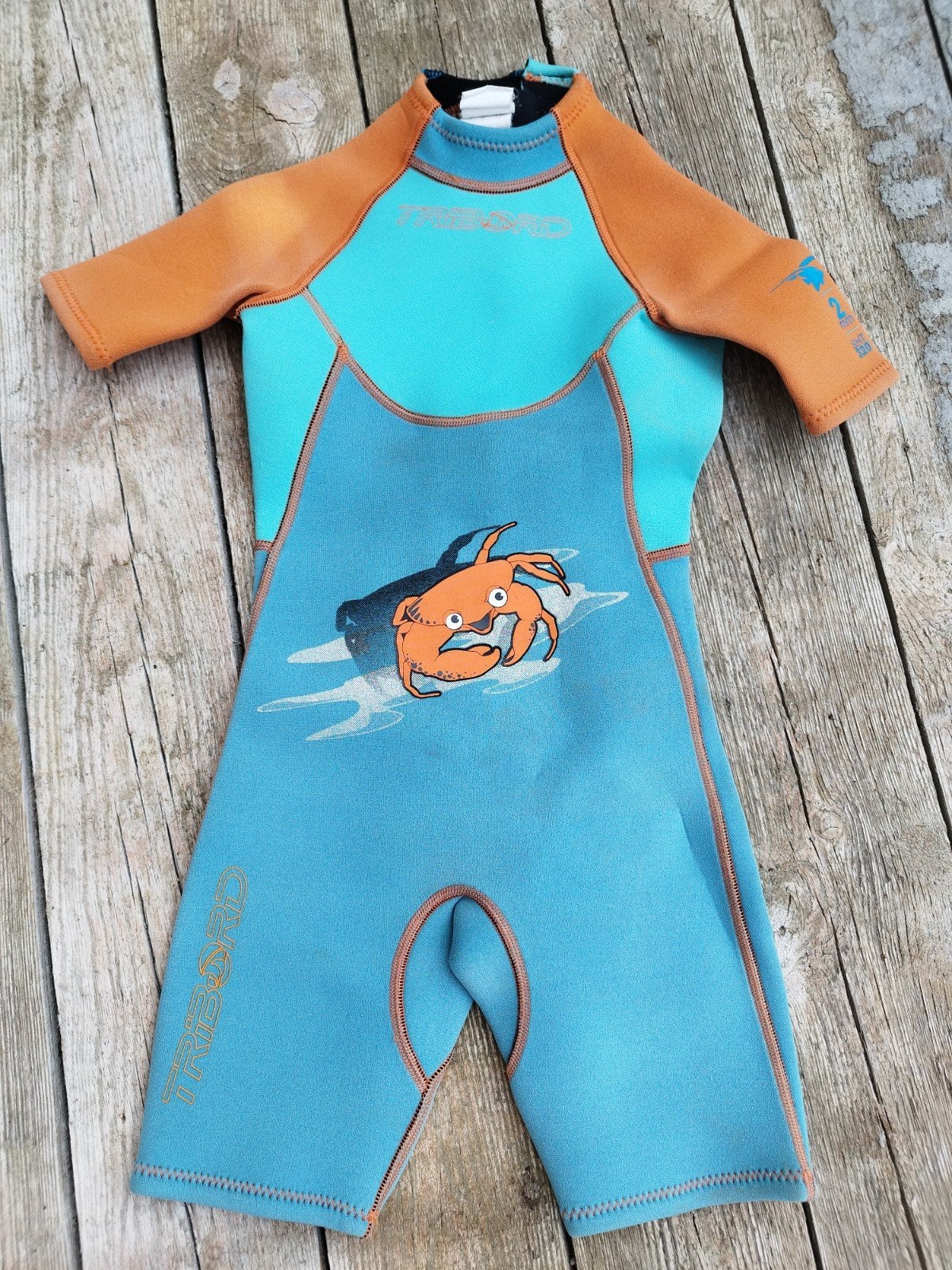 Neopreenpak van 6 jaar oud, Ophalen