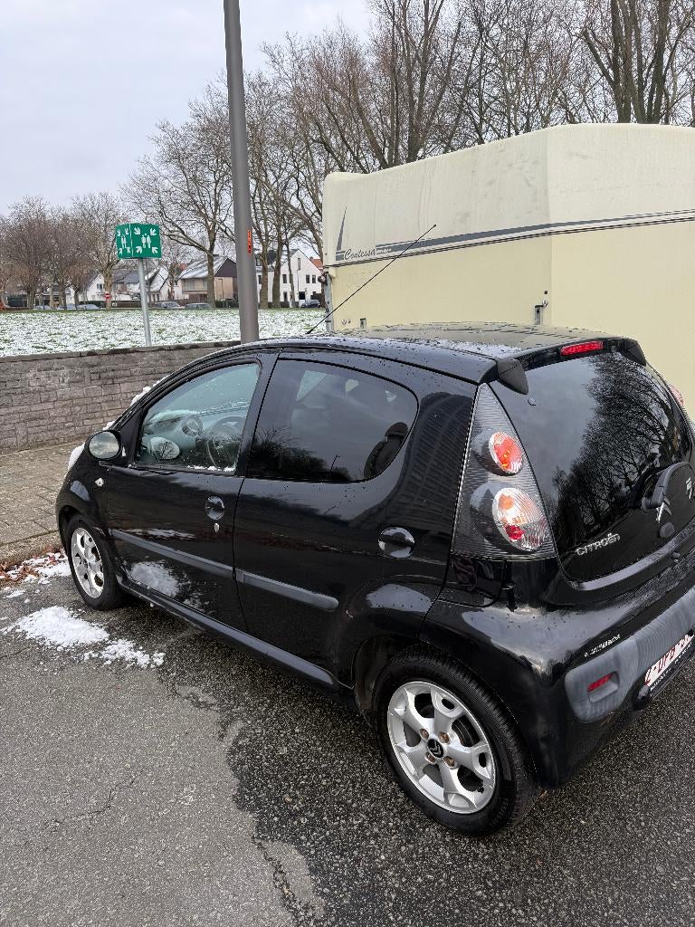 CITROËN C1 1.0 BENZINE 2014 EURO 5b, Auto's, Citroën, Voorwielaandrijving, Euro 5, Stof, Zwart