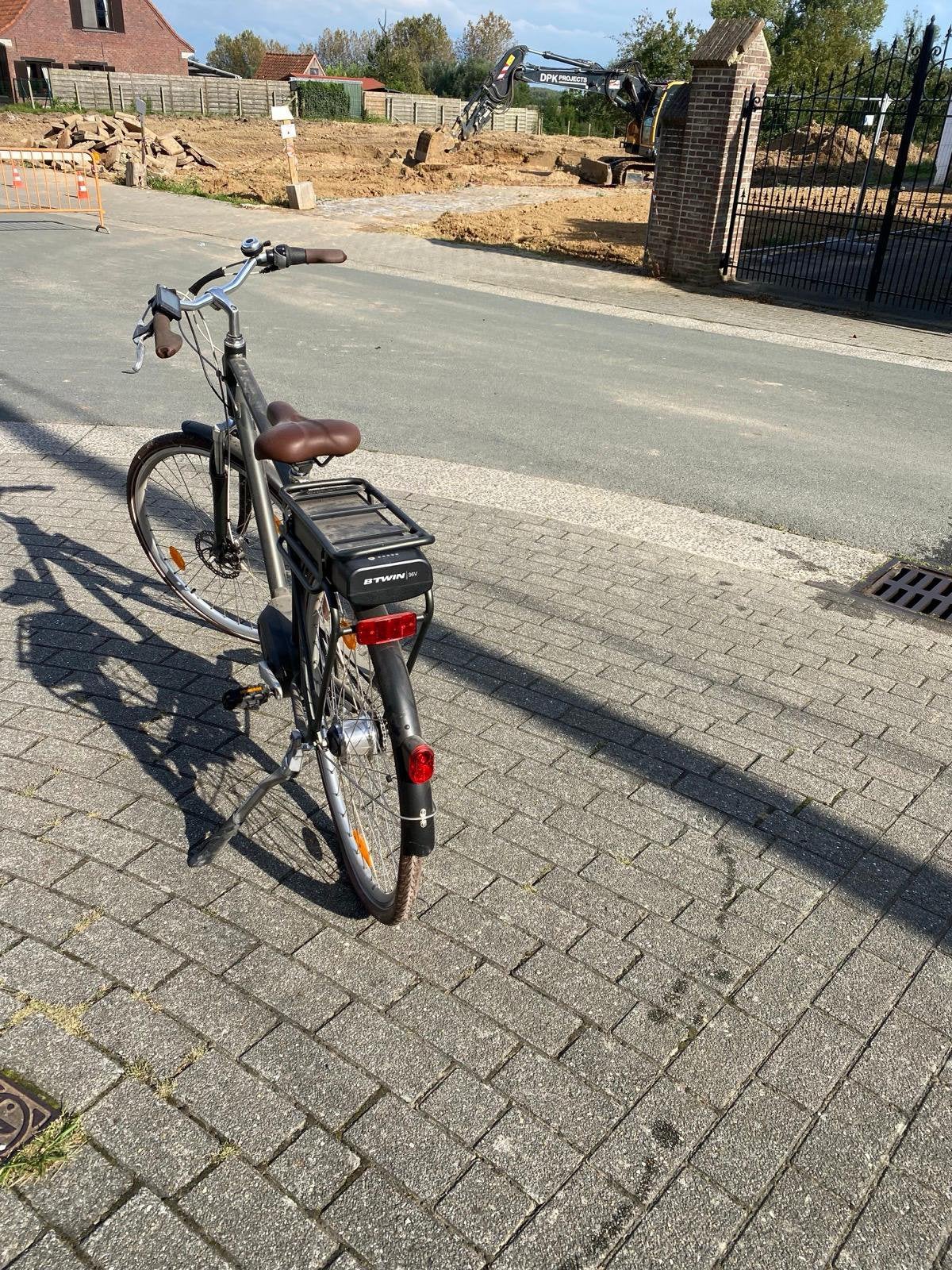 B’Twin electrische mannenfiets, Ophalen