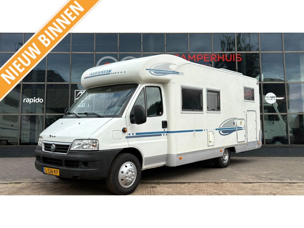 Adria Coral 660 SL Enkele Bedden,Airco,130PK, Caravans en Kamperen, Mobilhomes, Ringverwarming, 7 tot 8 meter, Bedrijf, Adria