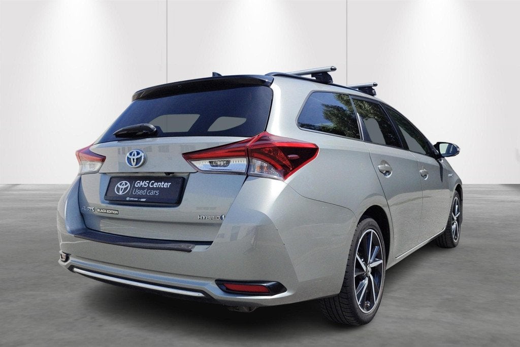 Toyota Auris Touring Sports 1.8 VVT-i Hybrid CVT Black Editi, Auto's, Stof, Gebruikt, 136 pk, https://public.car-pass.be/vhr/b317dee9-a0d8-46e1-a5a7-a6433b791ad7