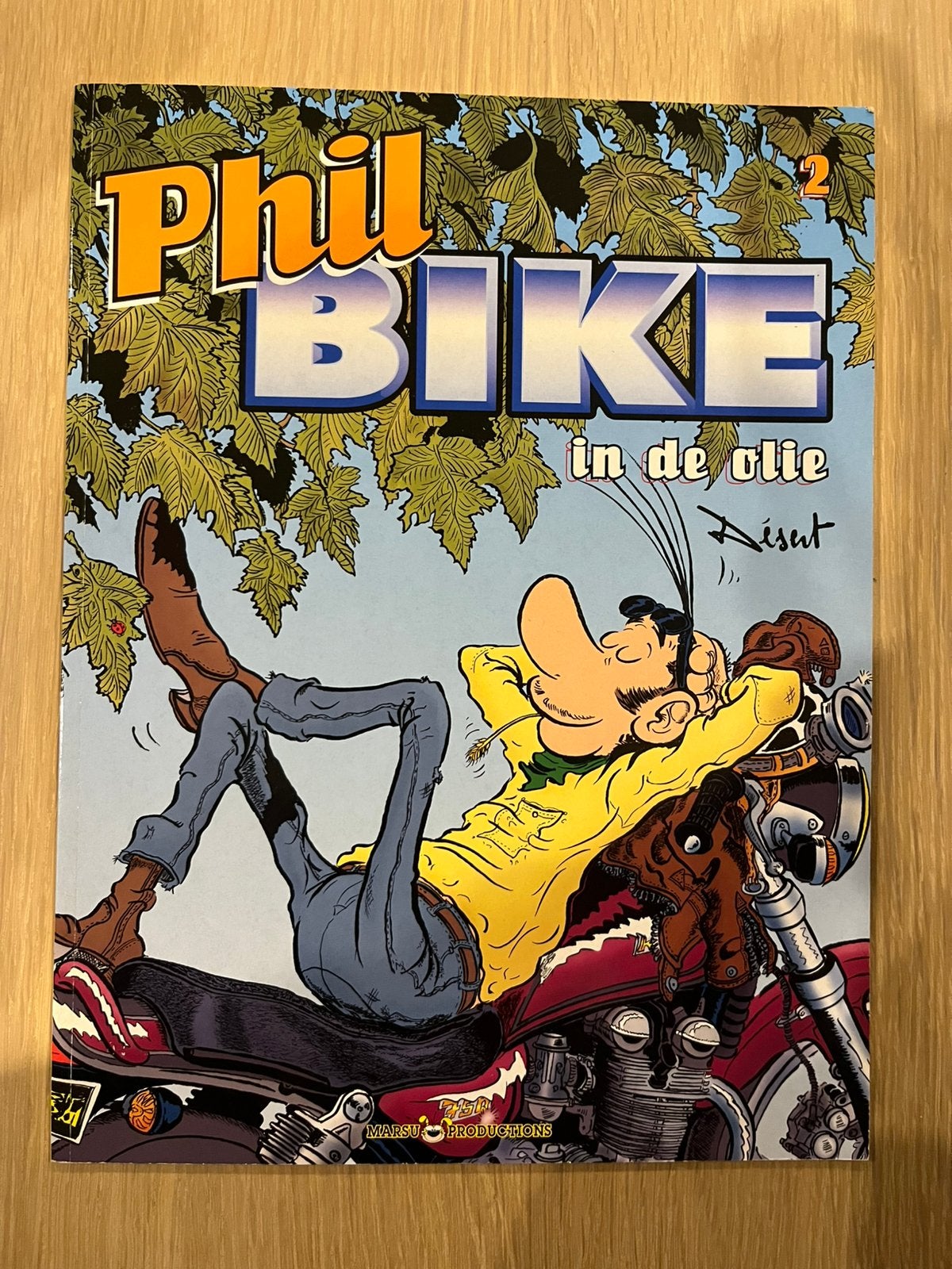 Phil Bike - 2 - in de olie, Boeken, Stripverhalen, Eén stripboek, Ophalen of Verzenden