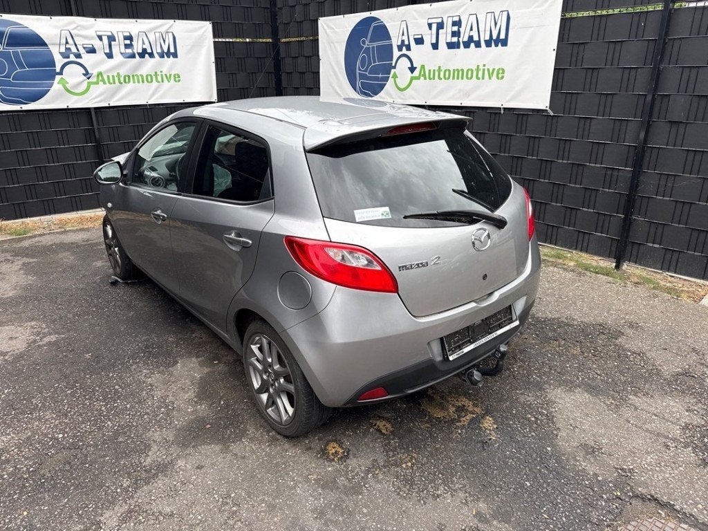 ACHTERAS VWA Mazda 2 (DE) (01-2007/06-2015) (|D03P28B00A|), Auto-onderdelen, Hitdorfer Straße 73
51371  Leverkusen, DE, Gebruikt