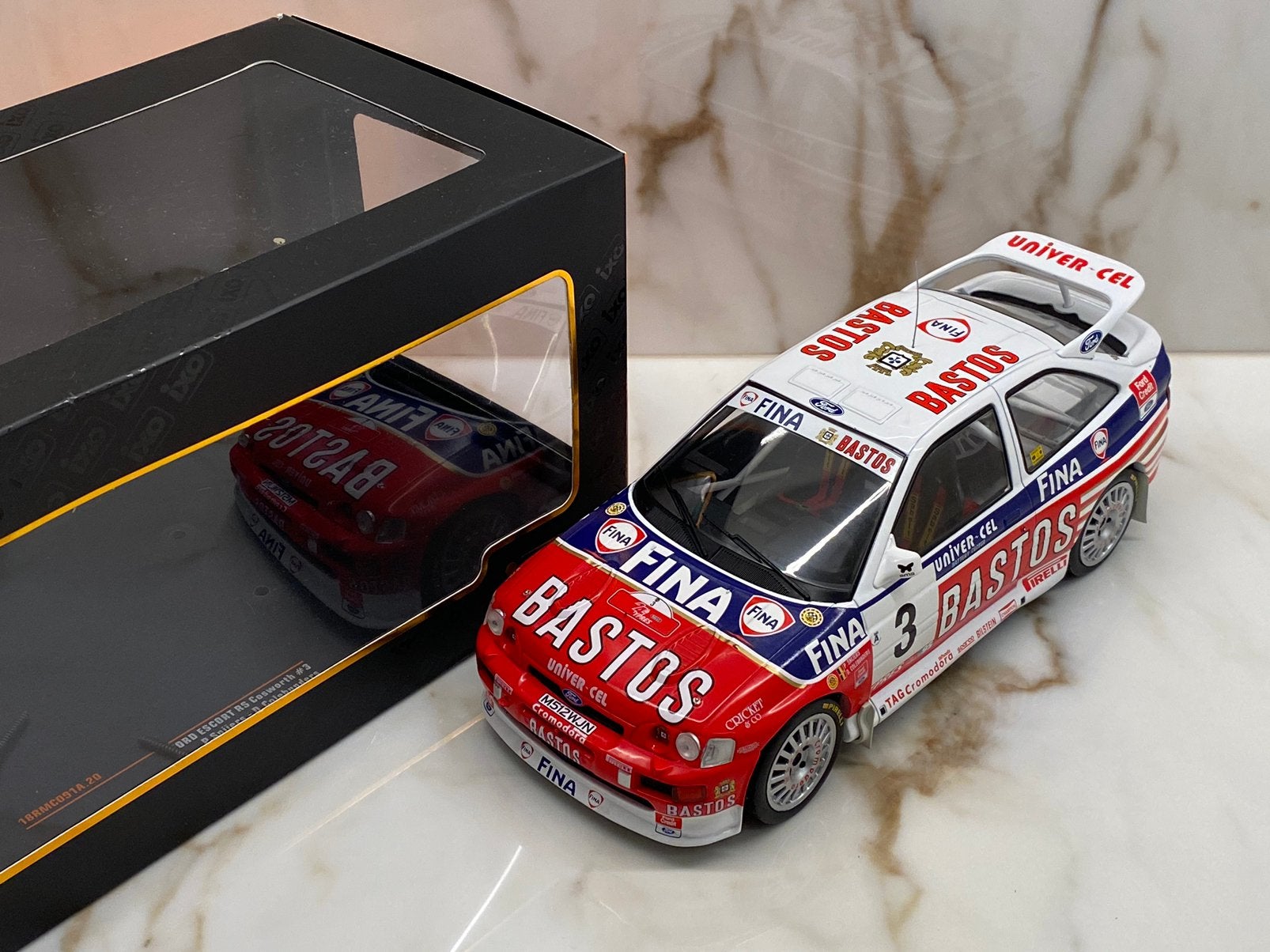 Ixo-Models Ford Escort RS Cosworth #3 Bastos- Fina  - 1:18, Ophalen of Verzenden, Zo goed als nieuw, Auto