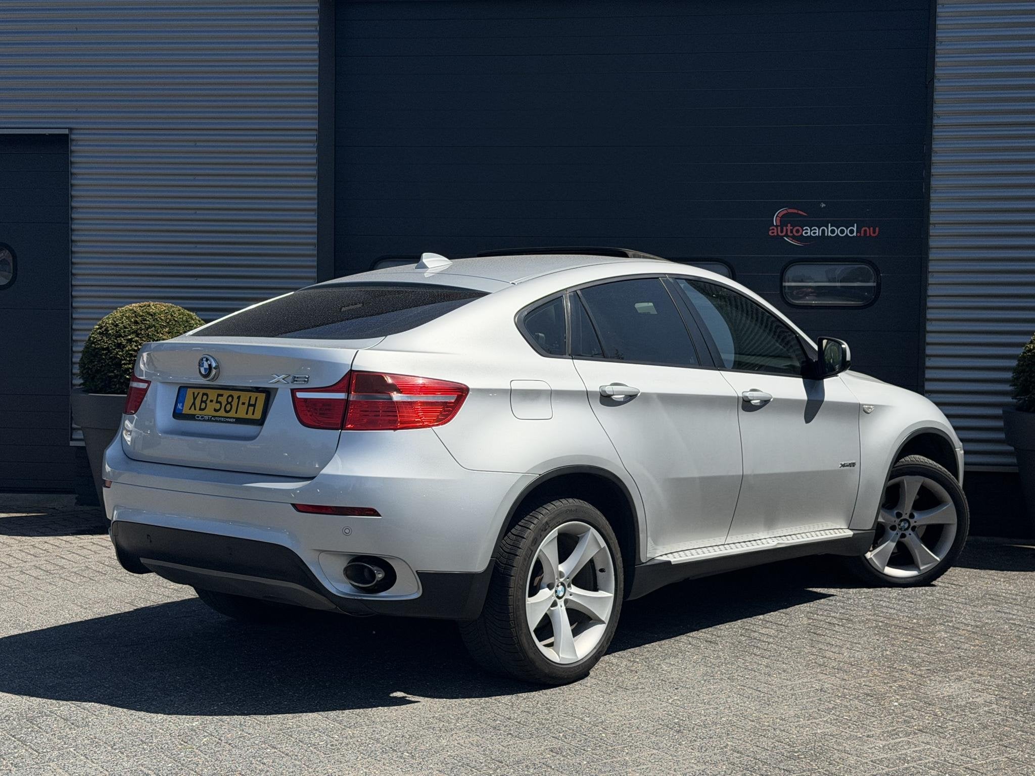 BMW X6 xDrive35i | Panoramadak | Head-Up Display | Xenon | E, Auto's, Gebruikt, 306 pk, SUV of Terreinwagen, Zilver of Grijs