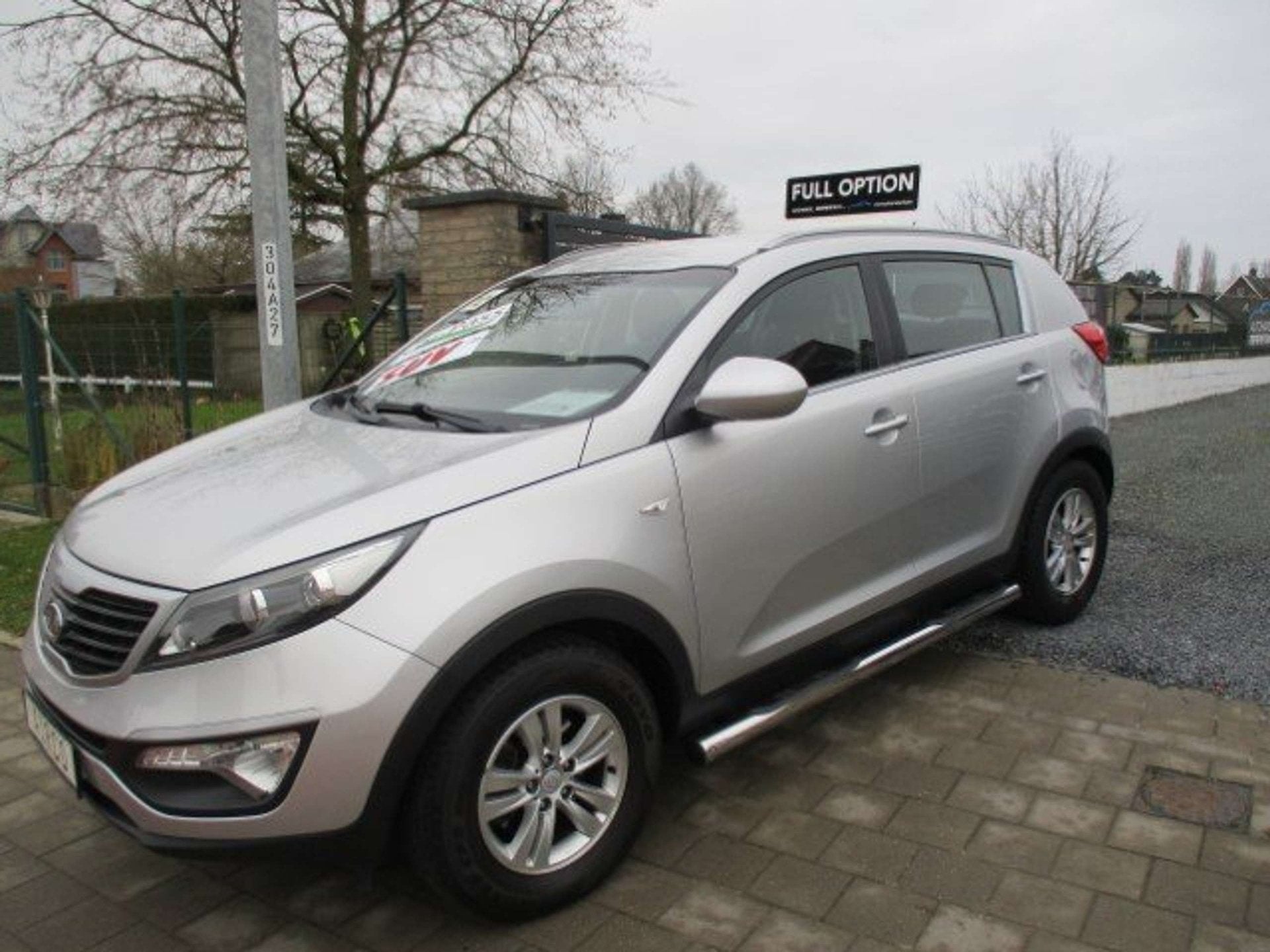 Kia Sportage 1.6i 2WD DYNAMIQUE ISG AIRCO ALU PDC TOPSTAAT 1, Auto's, Stof, Gebruikt, 149 g/km, Bedrijf