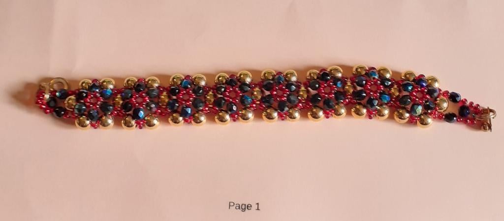 bracelet de fantaisie doré noir et rouge (2004), Bijoux, Sacs & Beauté, Bracelets, Enlèvement ou Envoi, Utilisé, Autres couleurs