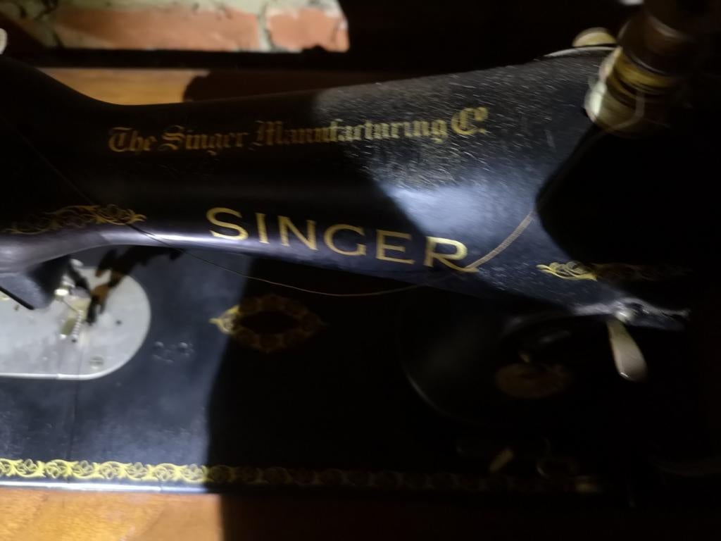 Singer naaimachine., Ophalen