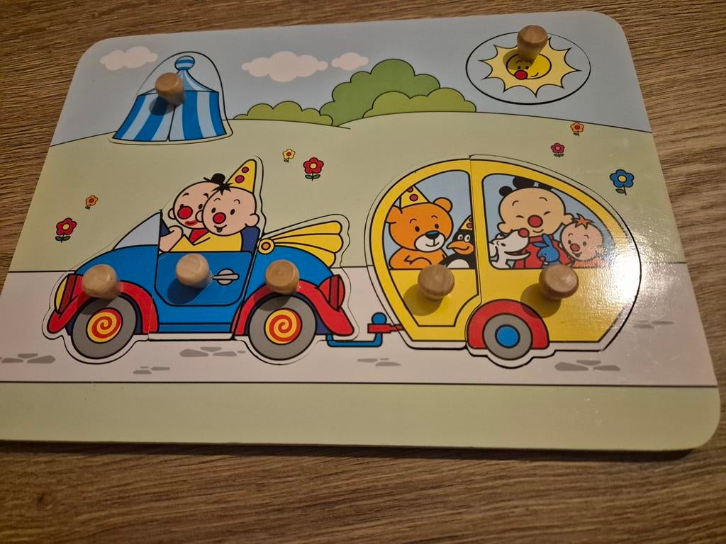 Houten steekpuzzel Bumba, Enlèvement