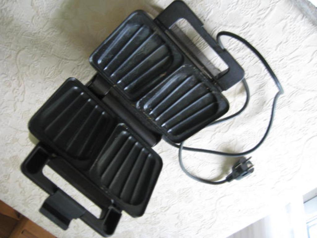 sandwich toaster Nova, Ophalen